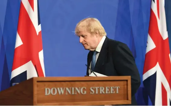  ??  ?? Britain's Prime Minister Boris Johnson leaves, after a coronaviru­s briefing in Downing Street, London, last Monday.