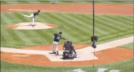  ?? Kathy Willens / Associated Press ?? The Yankees’ Matt Duffy (18) makes contact with a pitch thrown by Gerrit Cole, left, during an intrasquad game.