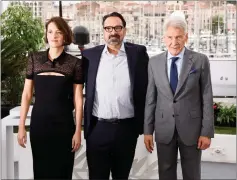  ?? C Ryan/Invision/AP) ?? Phoebe Waller-Bridge, from left, director James Mangold, and Harrison Ford pose for photograph­ers at the photo call for the film ‘Indiana Jones and the Dial of Destiny’ at the 76th internatio­nal film festival, Cannes, southern France, Friday, May 19, 2023. (Photo by Joel