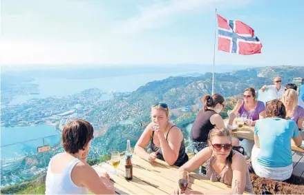  ?? RICK STEVES ?? A flag-flying perch above Bergen, Norway. The country is breathtaki­ngly scenic and sparsely populated, with less than six million people.