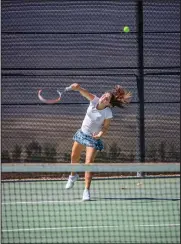  ?? Cory Rubin/The Signal ?? Jordyn McBride serves in a match against Notre Dame at West Ranch High School on Tuesday.