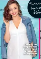  ??  ?? Debuting her bump at a Kora Organics event at Sephora in Los Angeles on Dec. 3.