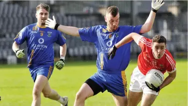  ??  ?? Calry’s Barry O’Boyle and Eoin Nicholson try to dispossess Coolera’s Aron O’Boyle. Pic: Carl Brennan.