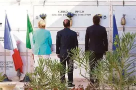  ?? Carlo Hermann / Associated Press ?? German Chancellor Angela Merkel, left, French President Francois Holland, center, and Italian Premier Matteo Renzi pay homage at the tomb of Altiero Spinelli, one of the founding fathers of European unity, on Monday.