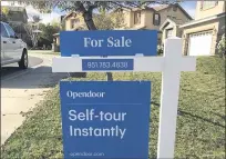  ?? PHOTO BY JEFF COLLINS ?? Zillow Offers, Opendoor, Offerpad and RedfinNow collective­ly spent more than $512 million buying houses this spring in Los Angeles, Orange, Riverside and San Bernardino counties, a study by Zillow found.