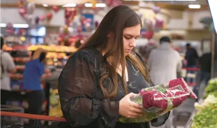  ?? ALLISON DINNER/AP ?? Preschool teacher Jacqueline Benitez expects to see a significan­t cut to the $250 she receives in food benefits each month in California.