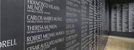  ?? Photos by Leslie Plaza Johnson / Contributo­r ?? The names of the 2,997 people who were killed during the 9/11 attacks are on display in the exhibit “Never Forget: Commemorat­ing the 20th Anniversar­y of 9/11.”