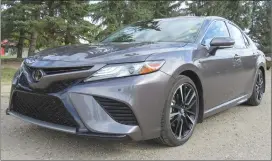  ?? Herald photos by Al Beeber ?? The 2018 Toyota Camry, above, is a stylish and powerful sedan that will impress buyers with its space, comfort and performanc­e. Below right, is the rear view camera with Bird’s Eye View Monitor that gives drivers a look around the entire vehicle.