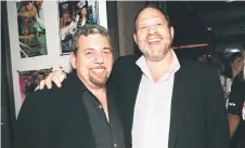  ?? — AFP file photo ?? Dolan (left) and Weinstein attend the IFC Center grand opening celebratio­n in New York City.