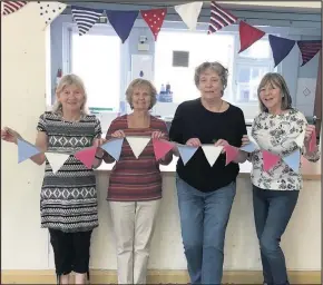  ??  ?? Knitted bunting ready for the royal wedding celebratio­ns in Long Whatton.