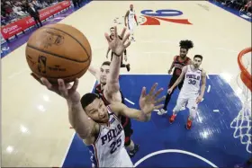  ?? THE ASSOCIATED PRESS FILE ?? Sixers point guard Ben Simmons, shown in a game against Chicago earlier this month, may not show up ready for game action anytime soon.