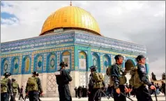  ??  ?? Israeli policemen stand guard near the Dome of the Rock in Jerusalem's old city. AFP