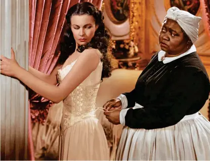  ?? ?? Coveted: Vivien Leigh, left, with Hattie McDaniel in the iconic 1939 movie Gone With The Wind