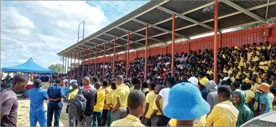  ?? Photo: John Muyamba ?? In limbo… Parents and children in search of school space gathered at the Rundu Secondary School sports field to be addressed on the way forward.