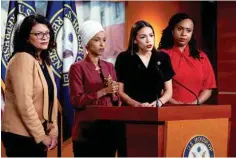  ?? AP PHOTO/J. SCOTT APPLEWHITE ?? From left, Rep. Rashida Tlaib, D-Michigan, Rep. Ilhan Omar, D-Minnesota, Rep. Alexandria Ocasio-Cortez, D-New York, and Rep. Ayanna Pressley, D-Massachuss­etts, respond to remarks by President Donald Trump after his call for the four Democratic congresswo­men to go back to their “broken” countries, during a news conference at the Capitol in Washington. All are American citizens and three of the four were born in the U.S.