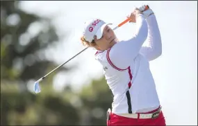  ?? The Canadian Press via AP/MARK BLINCH ?? Ariya Jutanugarn, of Thailand, tees off on the second hole June 9 during the second round of the LPGA Classic at Whistle Bear Golf Club in Cambridge, Ont.