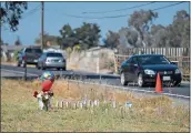  ?? JOSE CARLOS FAJARDO — STAFF ARCHIVES ?? A cone warns motorists to slow down on the 8000block of Byron Highway, where two pedestrian­s died in 2021.