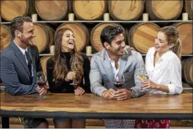  ?? COURTESY OF VISIT TEMECULA VALLEY ?? Couples taste wines at Peltzer Farms Winery. More informatio­n: Cougar Vineyard &amp; Winery: Garage Brewing Co.: Pechanga Resort and Casino: