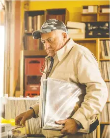  ?? MATT SMITH ?? Dave Doolittle, who is in his early 80s, owns about 35,000 vinyl records. He’s storing them in an old schoolhous­e in Maymont.