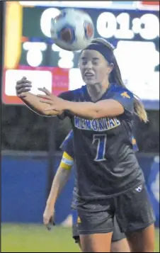  ?? Staff photo/Jake Dowling ?? St. Marys’ Elena Menker heads the ball toward the goal near the end of the first half of a Western Buckeye League soccer game against Shawnee on Thursday at Roughrider Field.