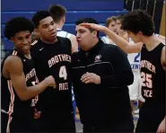  ?? DREW ELLIS — MEDIANEWS GROUP, FILE ?? Birmingham Brother Rice coach Rick Palmer is prepared to have his kids begin playing games out-of-state starting Feb. 6 if the MDHHS and Gov. Gretchen Whitmer don’t reverse the ban on indoor contact sports.