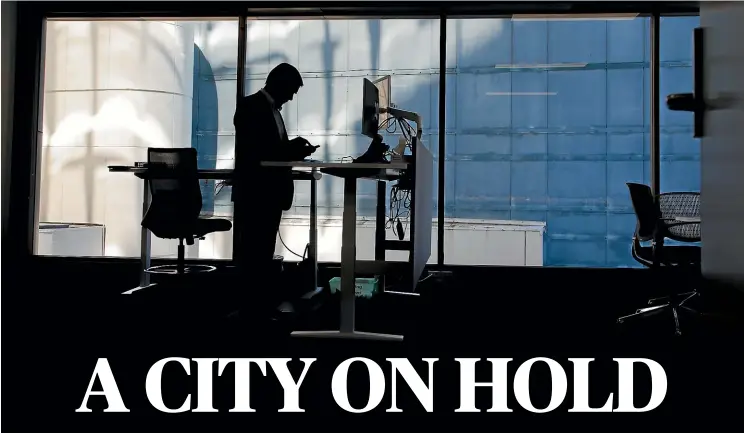  ?? ROSS GIBLIN/STUFF ?? Wellington mayor elect Andy Foster in his Terrace office. He believes the possibilit­y of Justin Lester winning on a recount seems ‘‘most unlikely’’.