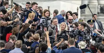  ?? KENNY HOLSTON/THE NEW YORK TIMES ?? U.S. Rep. Marjorie Taylor Greene speaks to reporters Wednesday after failing in her attempt to oust House Speaker Mike Johnson, a move met by booing from numerous Republican­s who helped stop her.