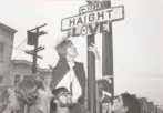  ?? The Chronicle 1967 ?? Hippies add love to the Haight and Ashbury street signs.
