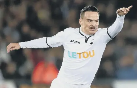  ??  ?? Swansea midfielder Roque Mesa has been linked with Newcastle and Fulham.