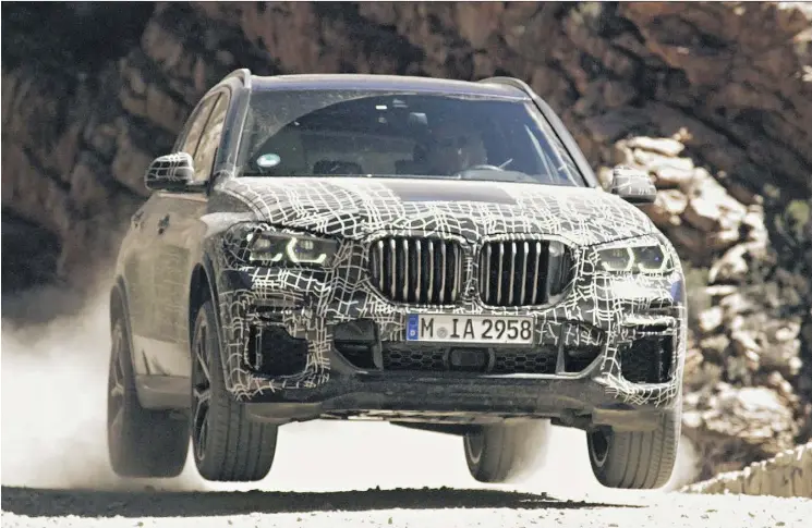  ?? BMW/DRIVING ?? The 2019 BMW X5 sharpens its appearance both inside and out, and offers improved driving dynamics. The fourth-generation SUV is heading for full production in August.