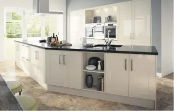  ??  ?? Fabulous design This Gloss Stone kitchen would proudly be at the heart of any home