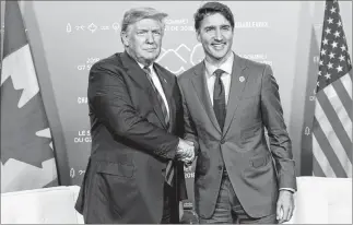 ?? THE CANADIAN PRESS/JUSTIN TANG ?? The relationsh­ip between Canadian Prime Minister Justin Trudeau and U.S. President Donald Trump, seen at the G7 leaders summit in La Malbaie, Que., on June 8, has reached a new low.