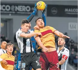  ??  ?? Declan Gallagher, right, challenges Conor McCarthy and keeper Vaclav Hladky