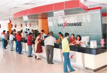  ?? Gulf News Archives ?? A UAE Exchange Branch. The new entity — incorporat­ing UAE Exchange, Travelex and Xpress Money — has plans to list on the London Stock Exchange.
