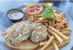  ?? ?? Grilled grouper sandwich at Dry Dock Waterfront Grill on Longboat Key