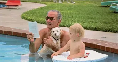  ?? LBJ Library photo by Yoichi R. Okamato ?? President Lyndon B. Johnson (holding his dog, Yuki) and his grandson, Patrick Lyndon Nugent.