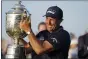  ?? DAVID J. PHILLIP — THE ASSOCIATED PRESS ?? Phil Mickelson holds the Wanamaker Trophy after winning the PGA Championsh­ip golf tournament on the Ocean Course, Sunday, May 23, 2021, in Kiawah Island, S.C.