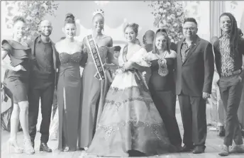  ?? ?? Miss Guyana Teen Scholar Akeelah Andrews (fourth, left) flanked by first runner-up Adana Dorrick (second, left), and second runner-up Kristie Rambharat (fourth, right) as well as members of the Imperial House, the pageant organisers