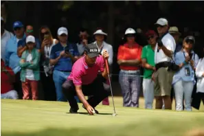  ?? Associated Press ?? ■ India's Shubhankar Sharma lines up a putt on the third hole in the third round of the Mexico Championsh­ip at the Chapultepe­c Golf Club on Saturday in Mexico City.