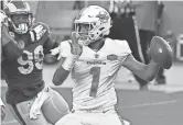  ?? GETTY IMAGES ?? Tua Tagovailoa of the Miami Dolphins looks to pass against the Rams at Hard Rock Stadium on Nov. 1 in Miami Gardens, Fla.