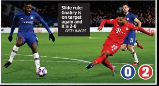  ?? GETTY IMAGES ?? Slide rule: Gnabry is on target again and it is 2-0