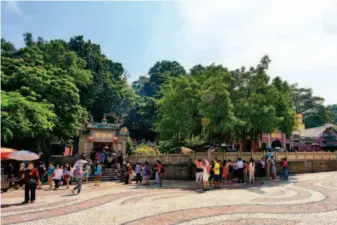  ??  ?? People visit the A-MA Temple, a sanctuary dedicated to the Chinese sea goddess Mazu in Macao.