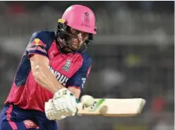  ?? Reuters ?? ↑ Rajasthan Royals’ Jos Buttler plays a shot against Kolkata Knight Riders during their IPL match.