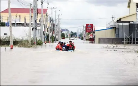  ?? HONG MENEA ?? In Cambodia, this year’s heavy monsoon rains have caused severe flooding. As we look towards the future more flooding and droughts across Southeast Asia are likely, placing global health security at risk and the global economy under increasing pressure.