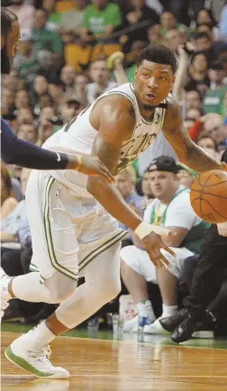  ?? STAFF FILE PHOTO BY CHRISTOPHE­R EVANS ?? NOT MUCH FREE TIME: Marcus Smart has been dealing with personal issues, including his sick mother, before focusing on his future and status with the Celtics.