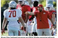  ?? DAVID JABLONSKI / STAFF ?? Ryan Day helped revamp an Ohio State passing attack in 2017 that had been a stagnant scheme the previous year.