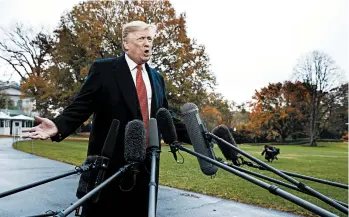  ?? EVAN VUCCI/AP ?? President Donald Trump talks with reporters Friday on the South Lawn of the White House before departing for France.