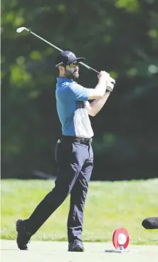  ?? LEON HALIP/GETTY IMAGES ?? Abbotsford’s Adam Hadwin is among a pack of players at 5-under 67 after Round 1 of the Rocket Mortgage Classic.