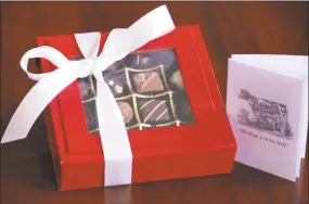  ?? Contribute­d photo ?? A holiday chocolate sampler of Milk House chocolates.