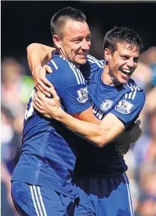  ?? GETTY ?? Chelsea have blended experience with youth, in John Terry (left) and Cesar Azpilicuet­a, to create their title-winning team